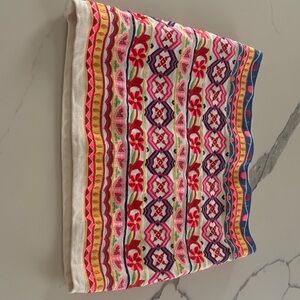 Harper mauve label on white fabric